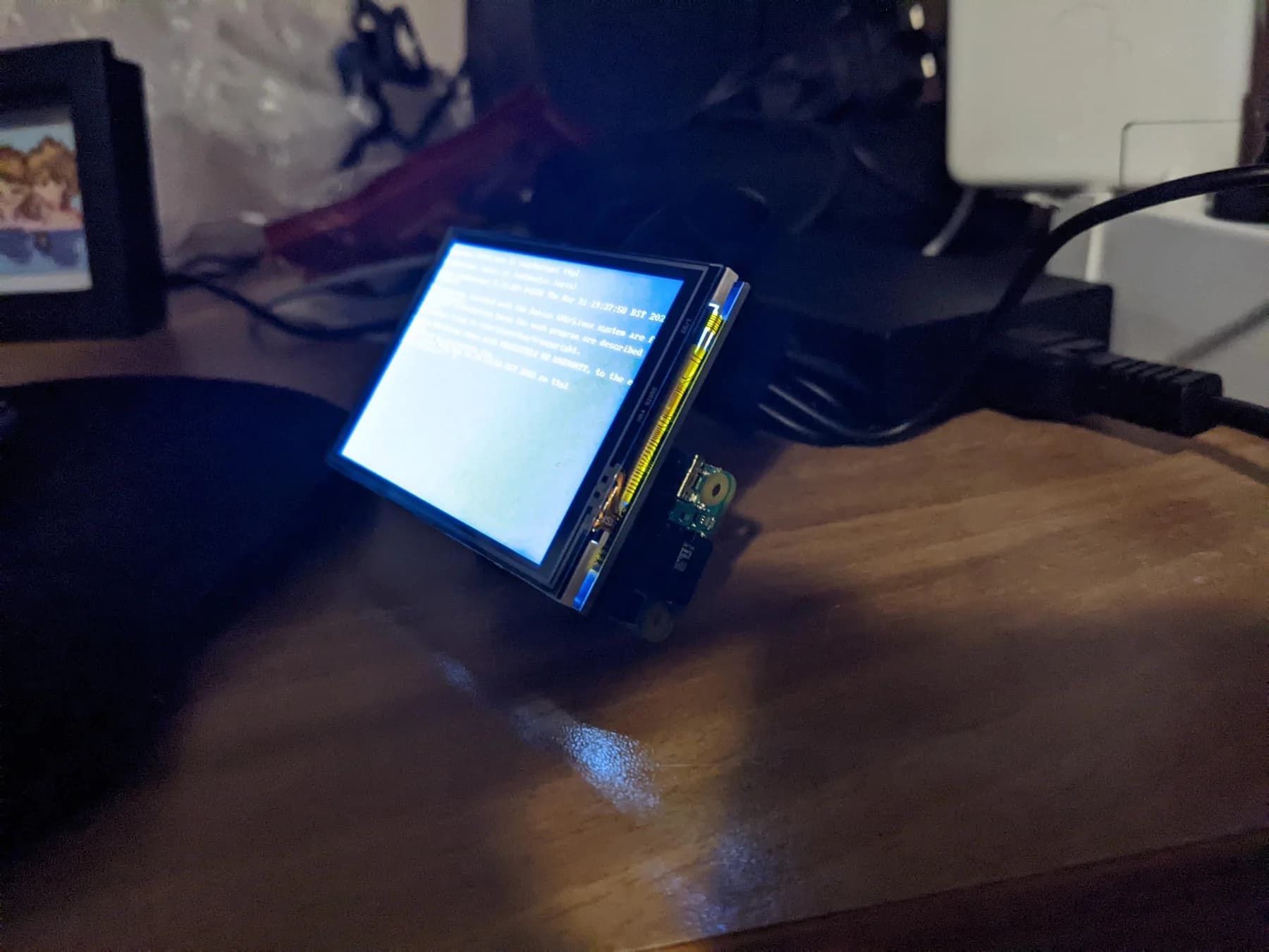 Raspberry Pi booting on a small LCD screen on a desk